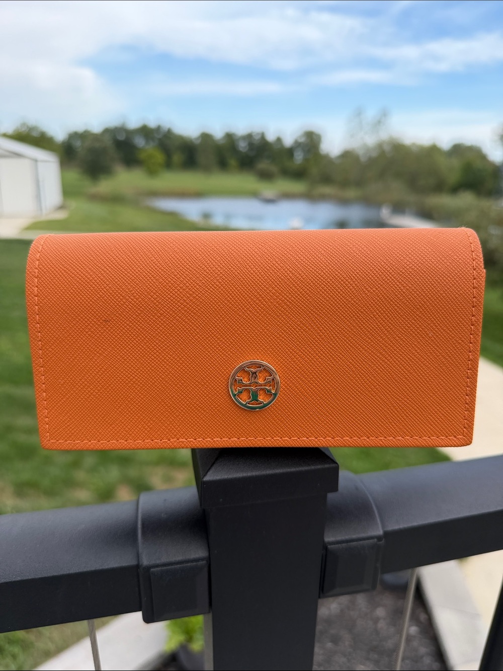 Tory Burch Orange Saffiano Continental sunglasses case with Logo Medallion